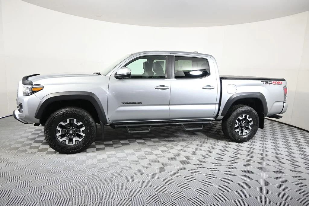 Used 2022 Toyota Tacoma TRD Off Road with VIN 3TMCZ5AN3NM497091 for sale in Forest Lake, Minnesota