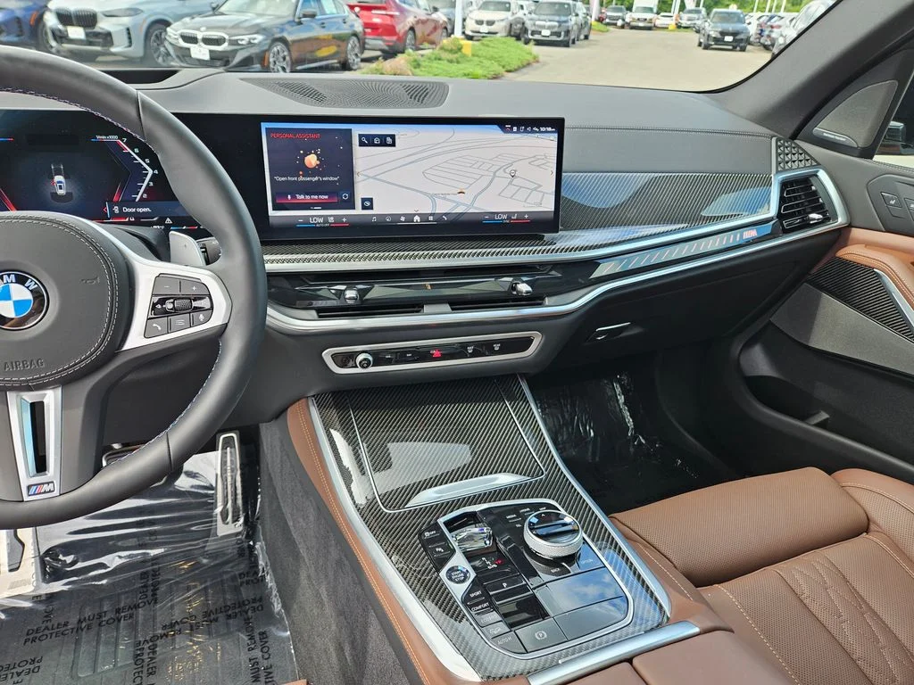 Used 2026 Mineral White Metallic BMW M60i image 28