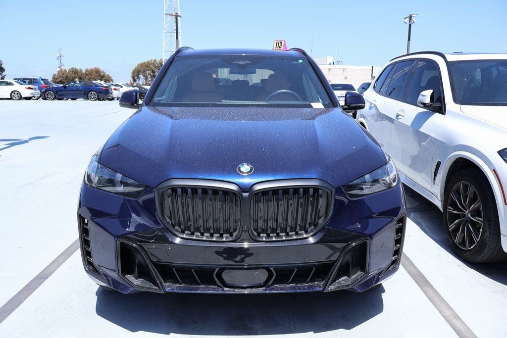 Certified Used 2025 Tanzanite Blue II Metallic BMW xDrive40i image 3