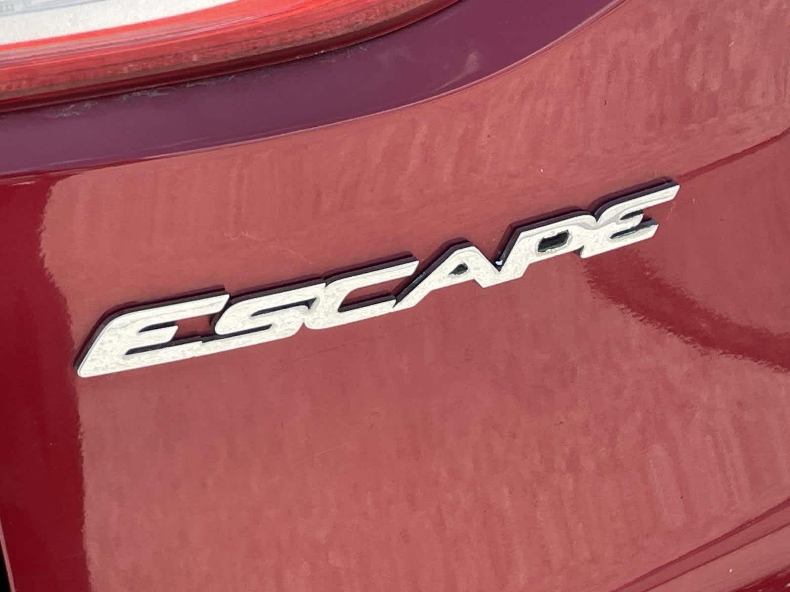 Used 2014 Ruby Red Tinted Clearcoat Ford SE image 14