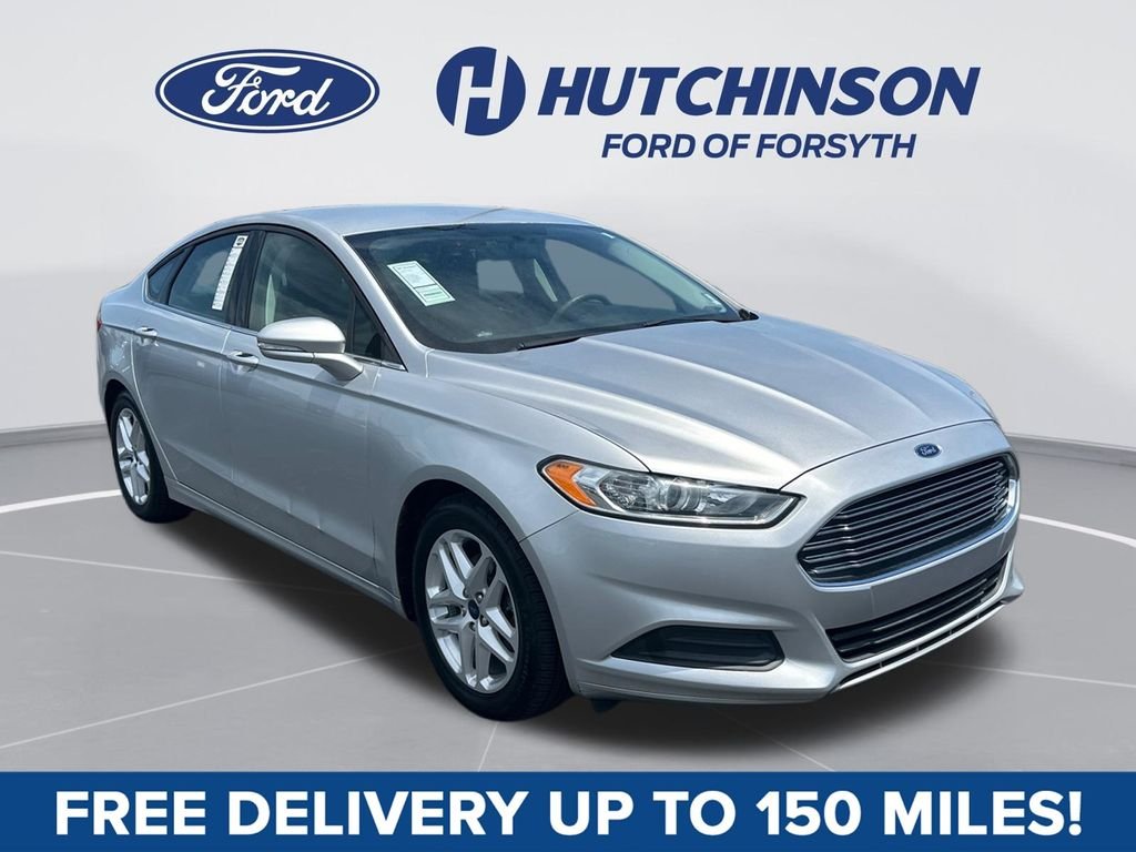 Used 2015 Ingot Silver Ford SE image 1