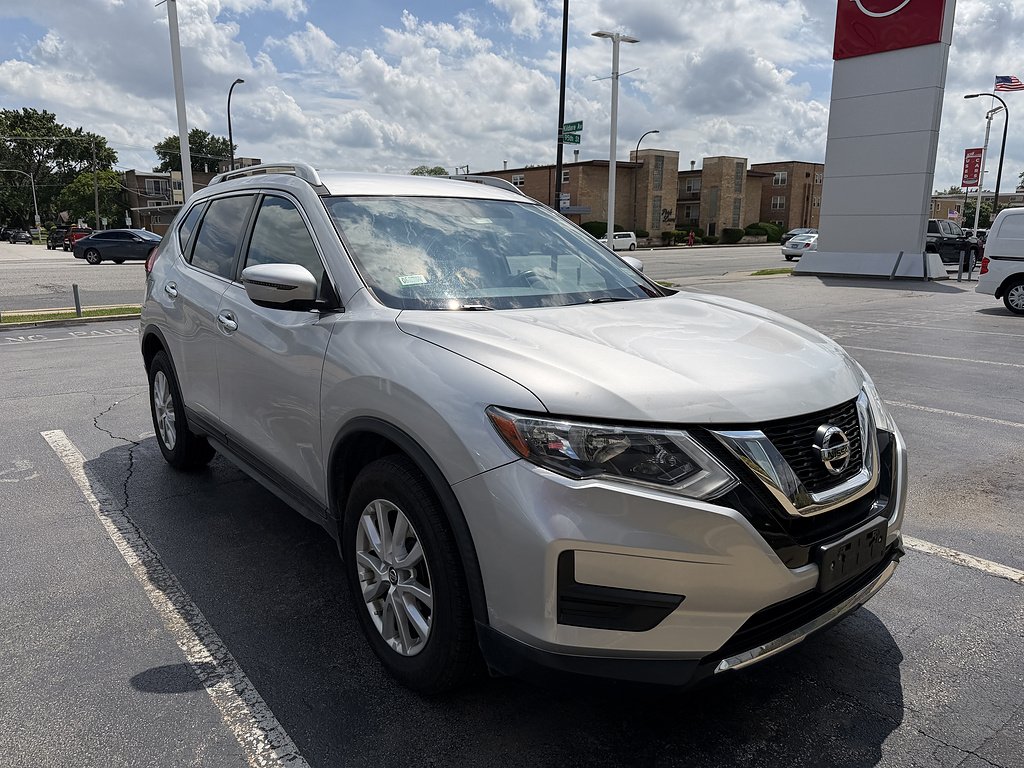 Used 2017 Brilliant Silver Nissan SV image 1