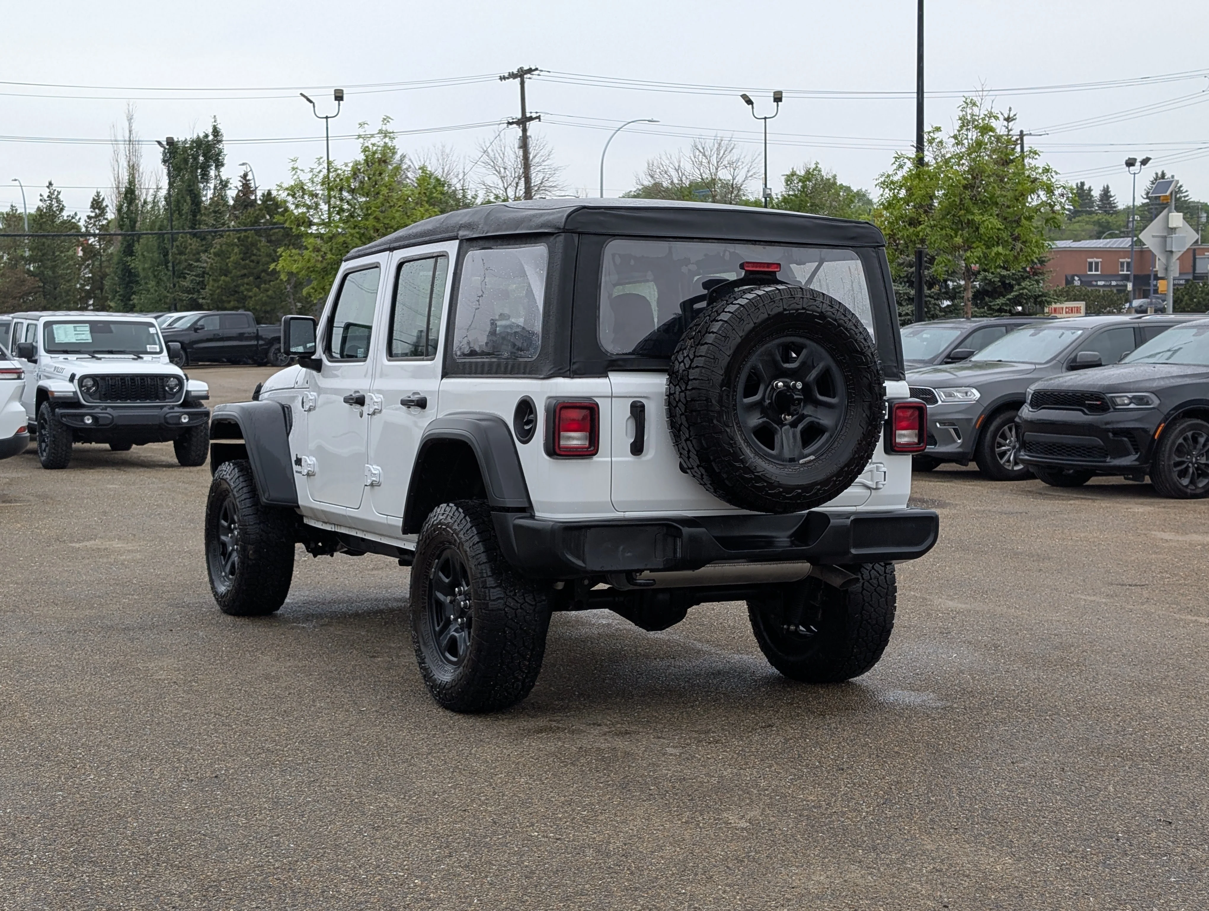 Used 2025 Bright White Jeep Sport image 4