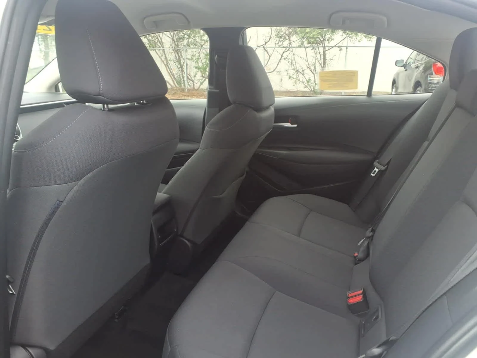 Used 2021 Super White Toyota LE image 12