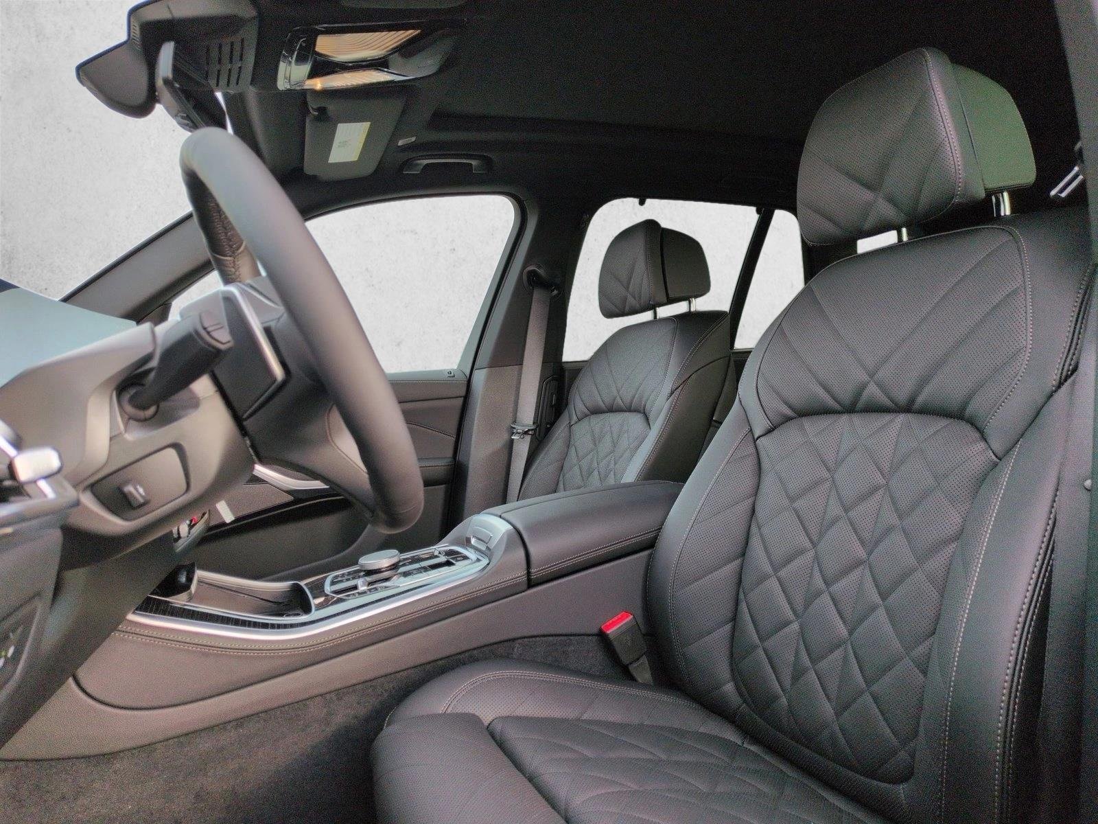 Used 2026 Black Sapphire Metallic BMW xDrive50e image 4