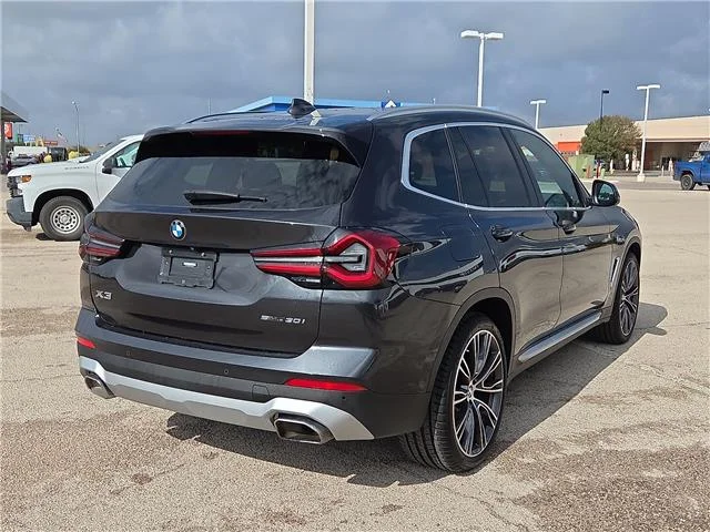 Used 2023 Black Sapphire Metallic BMW sDrive30i 4x2 Sports Activity Vehicle image 3