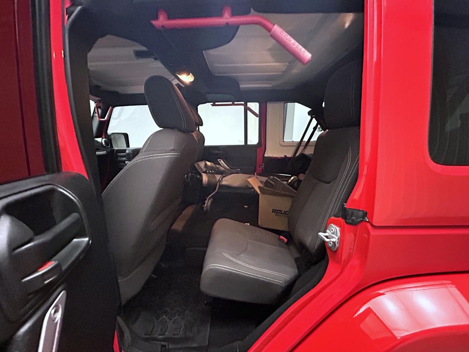Used 2016 Red Jeep Unlimited Sahara image 19