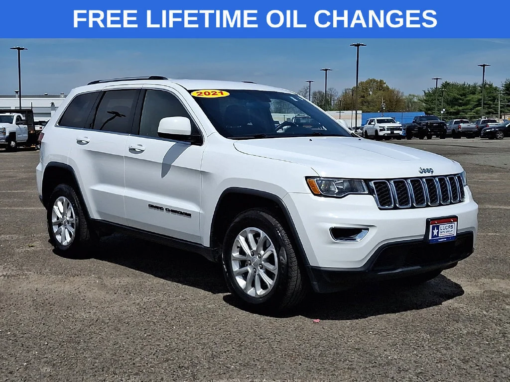Used 2021 Bright White Clearcoat Jeep Laredo E image 1