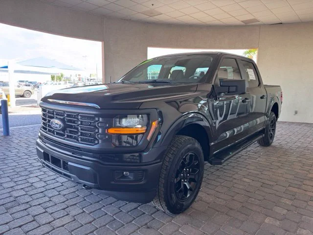 Certified Used 2025 Black Ford STX image 1