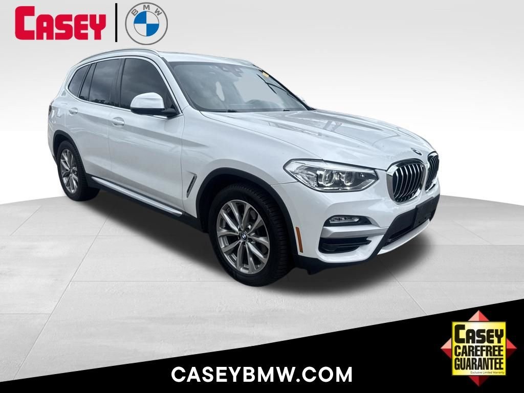 Used 2019 White BMW xDrive30i image 1