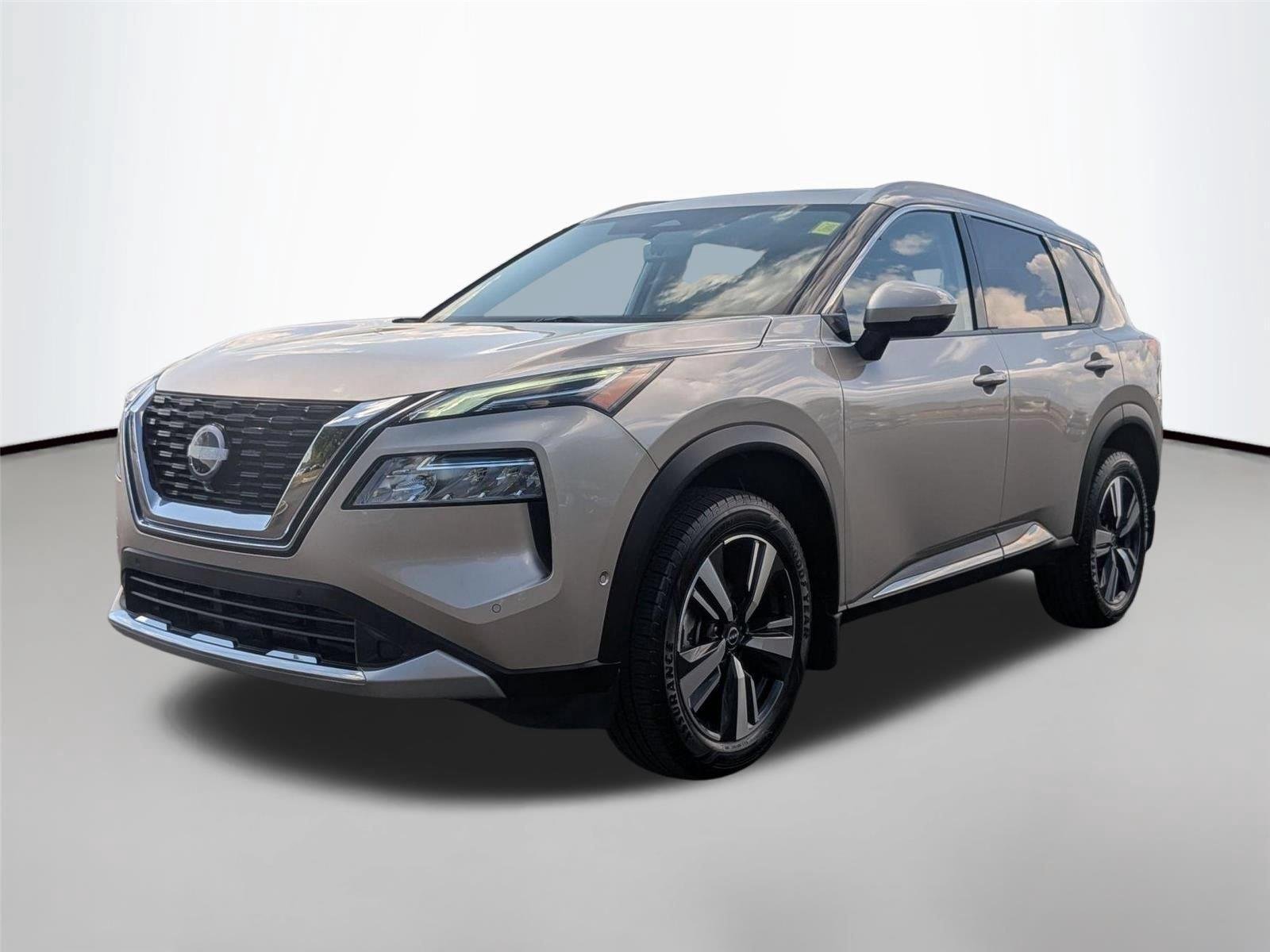 Used 2023 Champagne Silver Metallic Nissan Platinum image 1