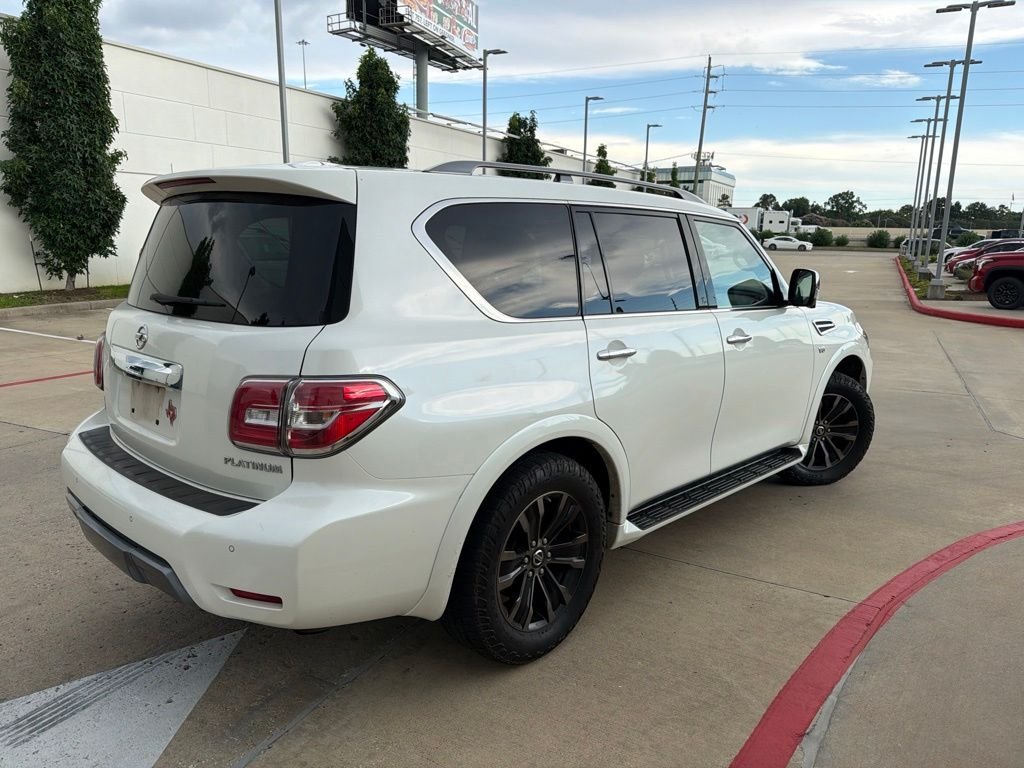 Used 2019 Pearl White Nissan Platinum image 3