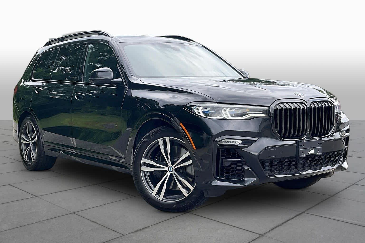 Used 2022 Black Sapphire Metallic BMW M50i image 2