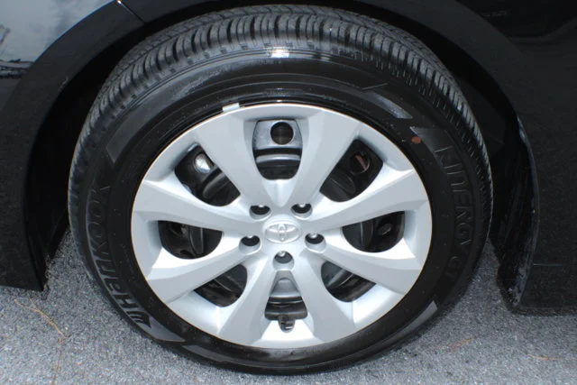 Used 2025 Midnight Black Metallic Toyota LE image 5