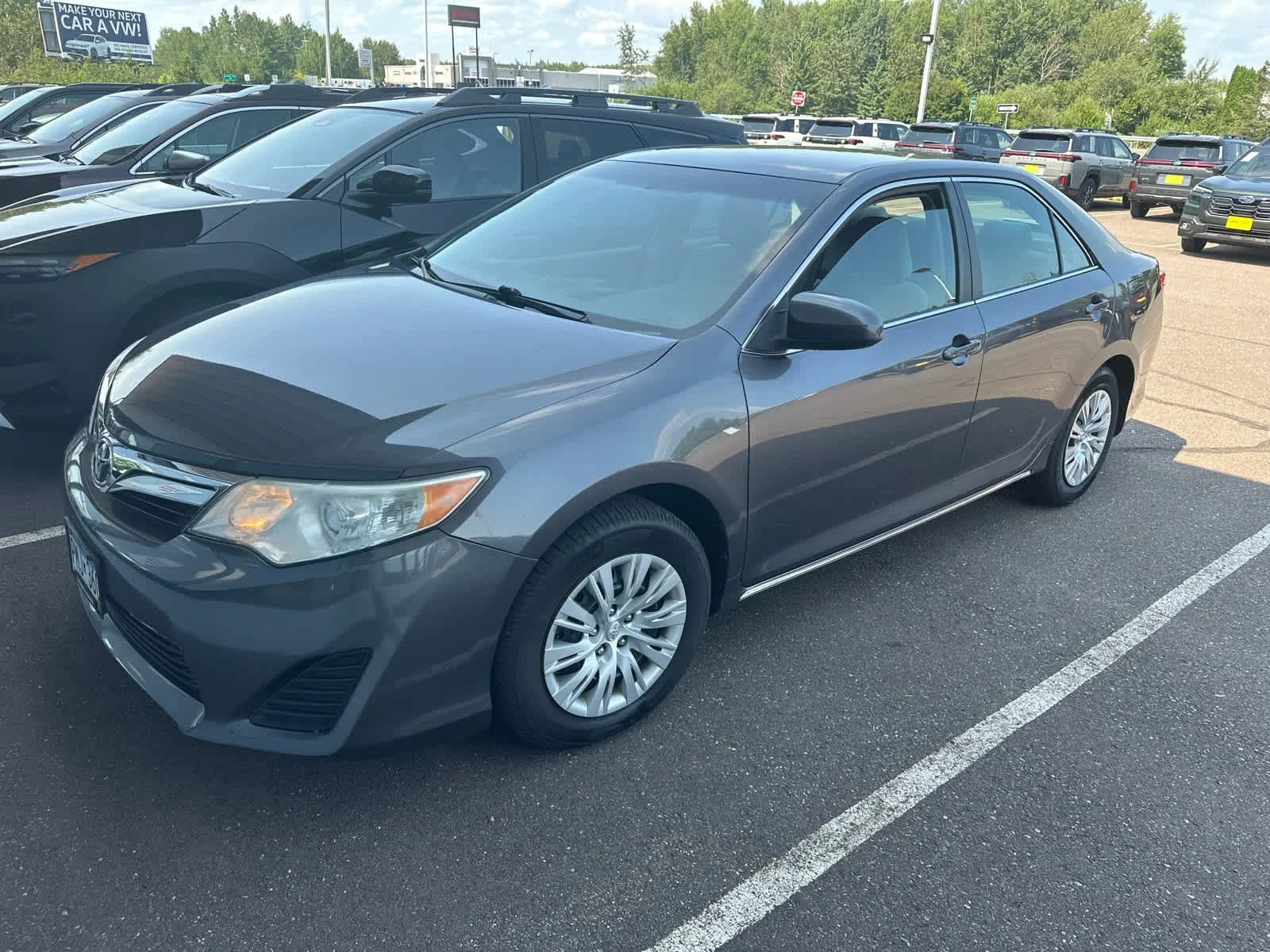 Used 2014 Magnetic Gray Metallic Toyota LE image 3