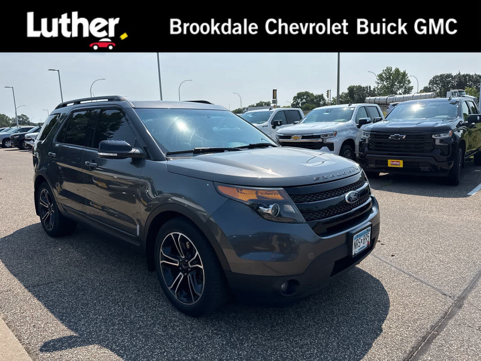 Used 2015 Magnetic Metallic Ford Sport image 1