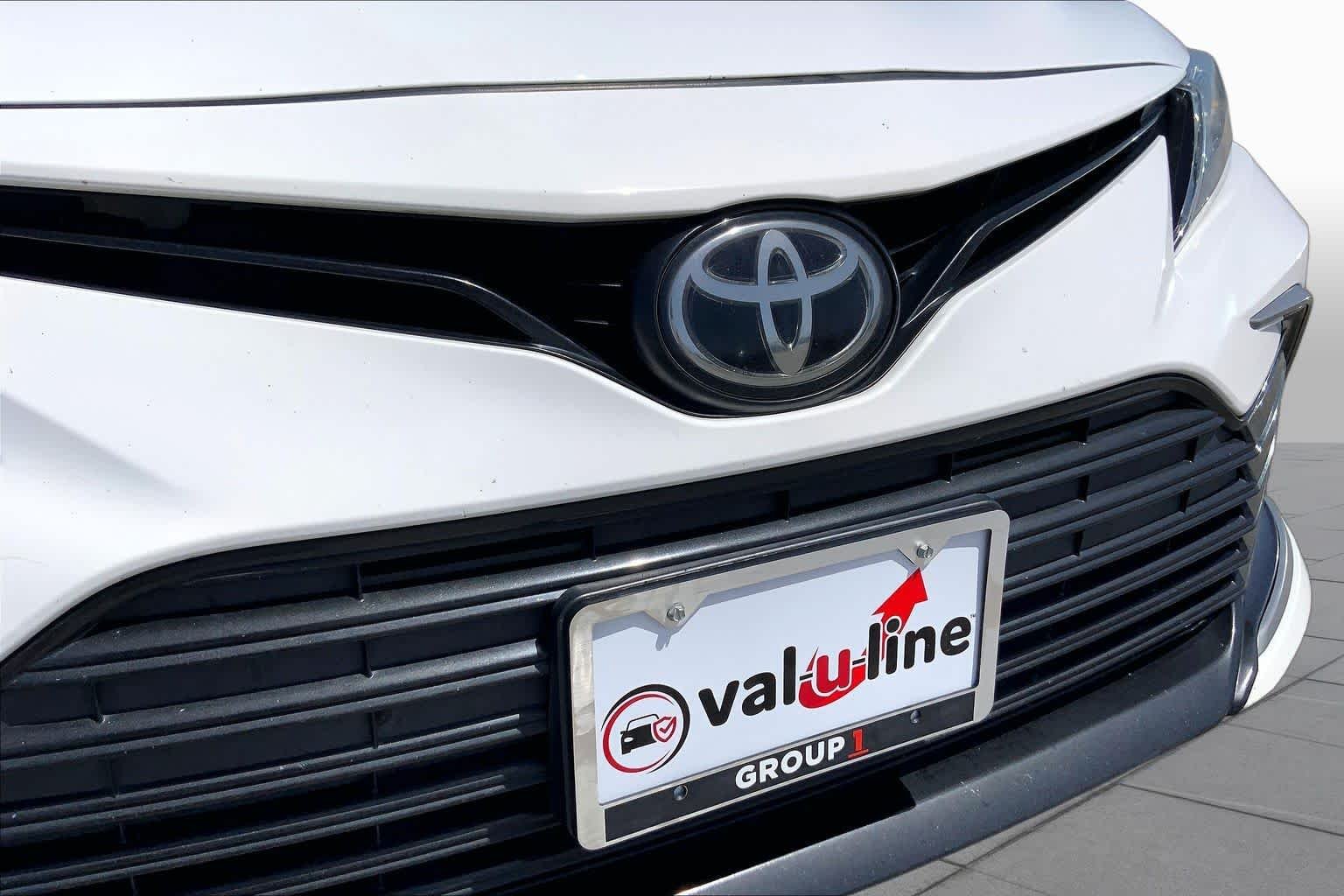 Used 2021 Super White Toyota LE image 29