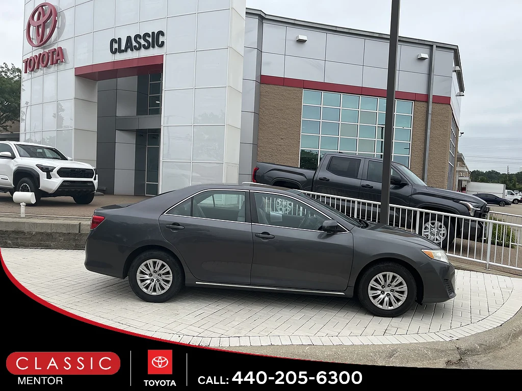 Used 2012 Magnetic Gray Metallic Toyota LE image 1
