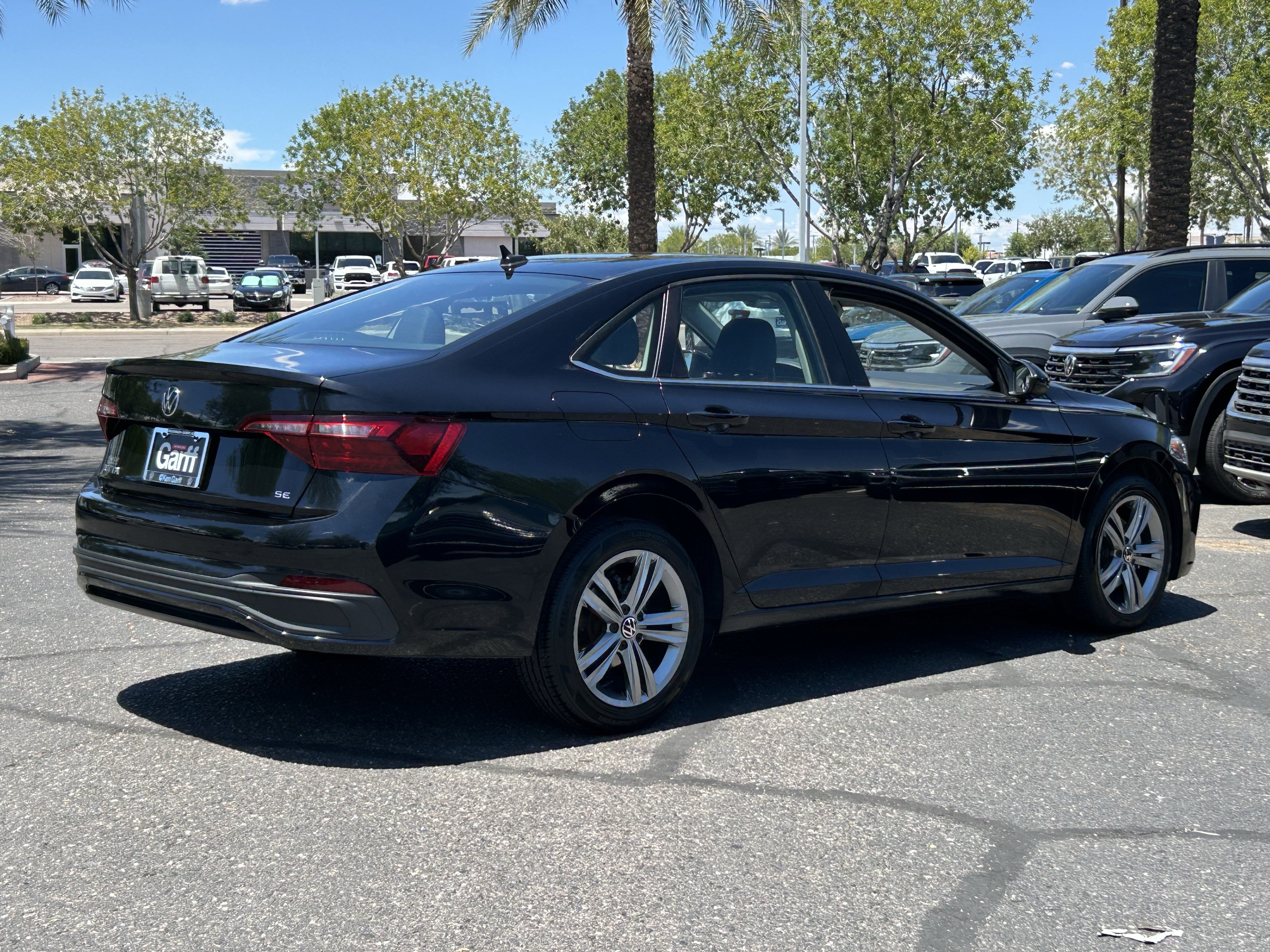 Used 2024 Black Volkswagen SE image 4