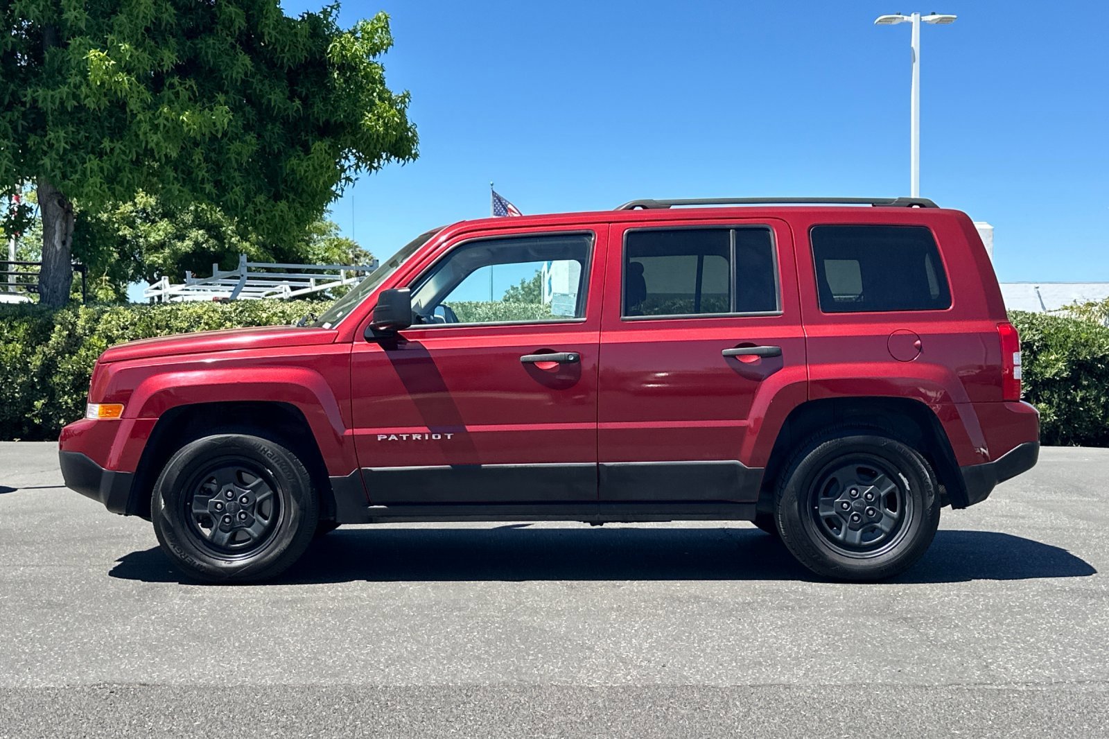 Used 2016 Deep Cherry Red Crystal Pearlcoat Jeep Sport image 7