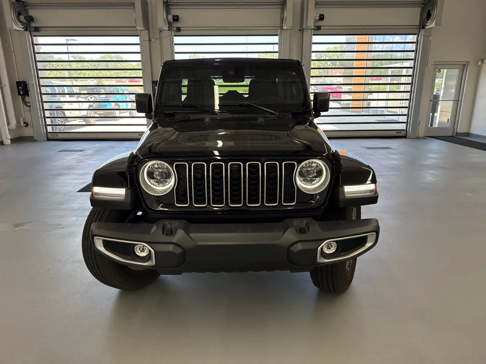 Used 2025 Jeep Wrangler 4-Door Sahara with VIN 1C4PJXEGXSW610336 for sale in Kansas City