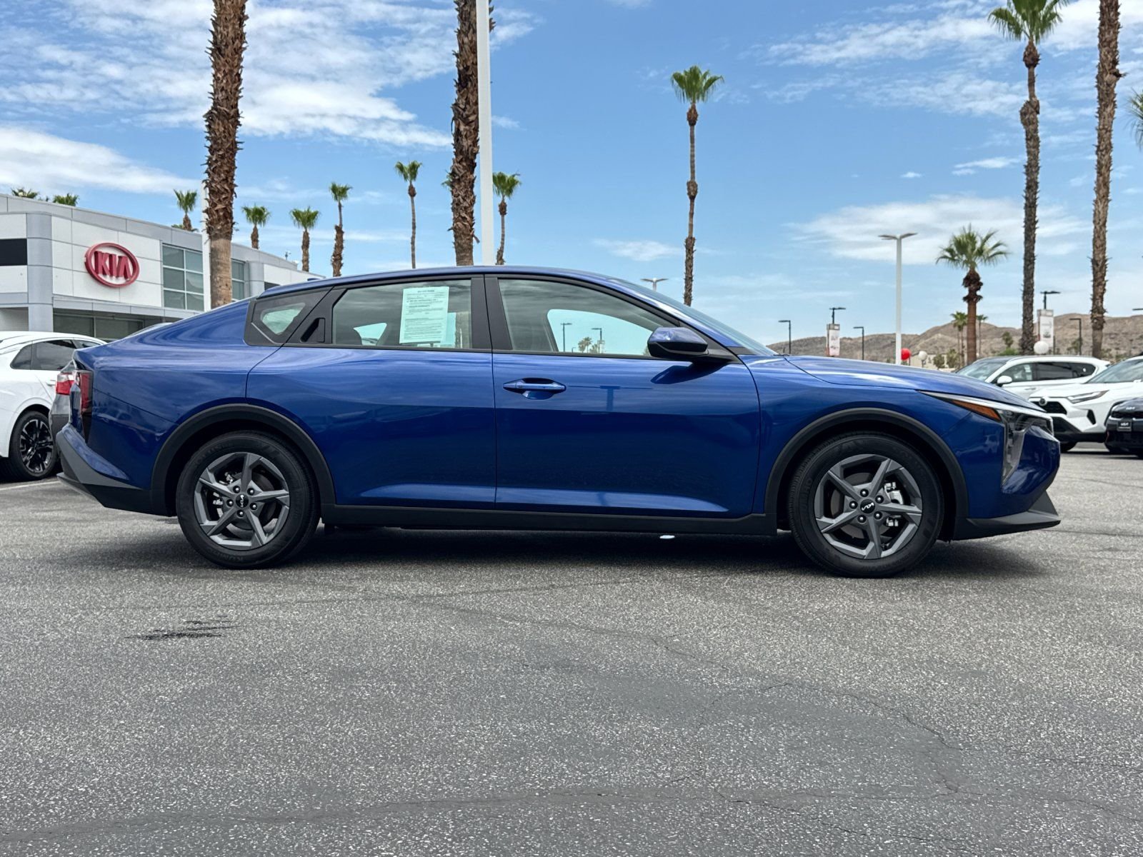 Certified Used 2025 Blue Kia LXS image 2