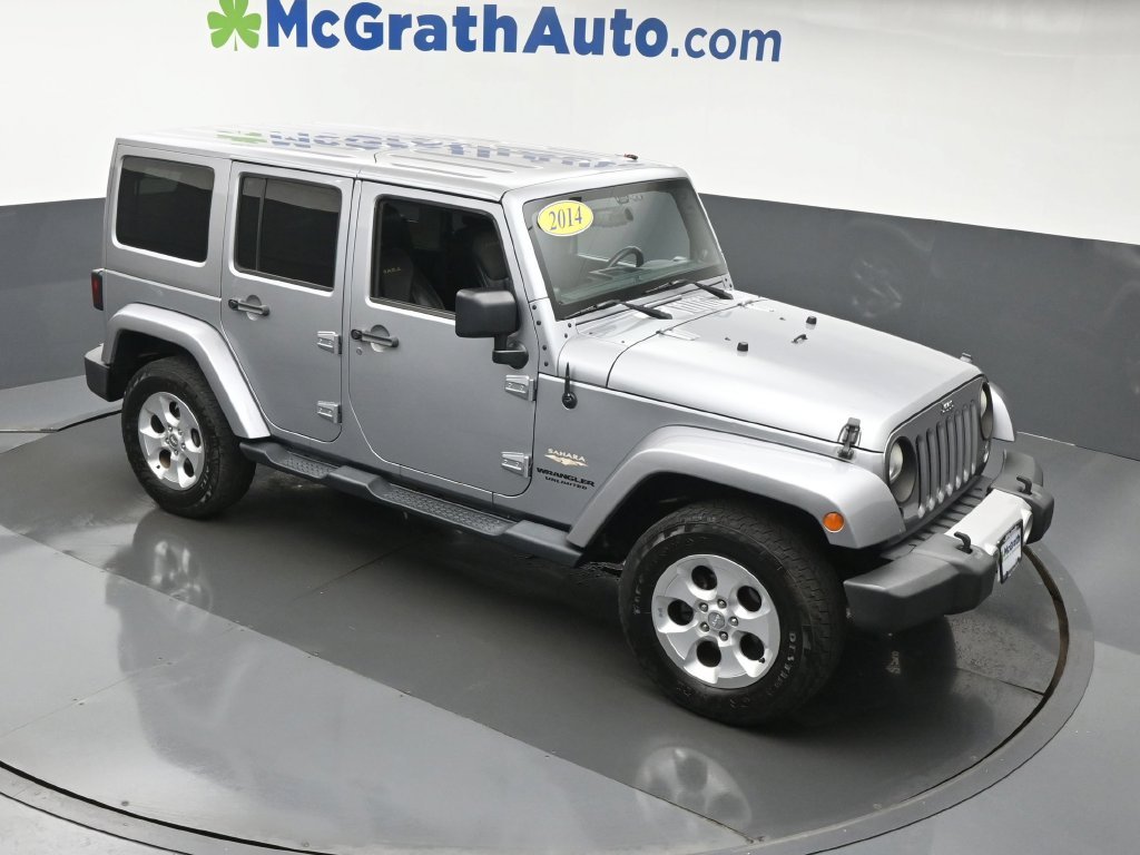 Used 2014 Gray Jeep Unlimited Sahara image 2