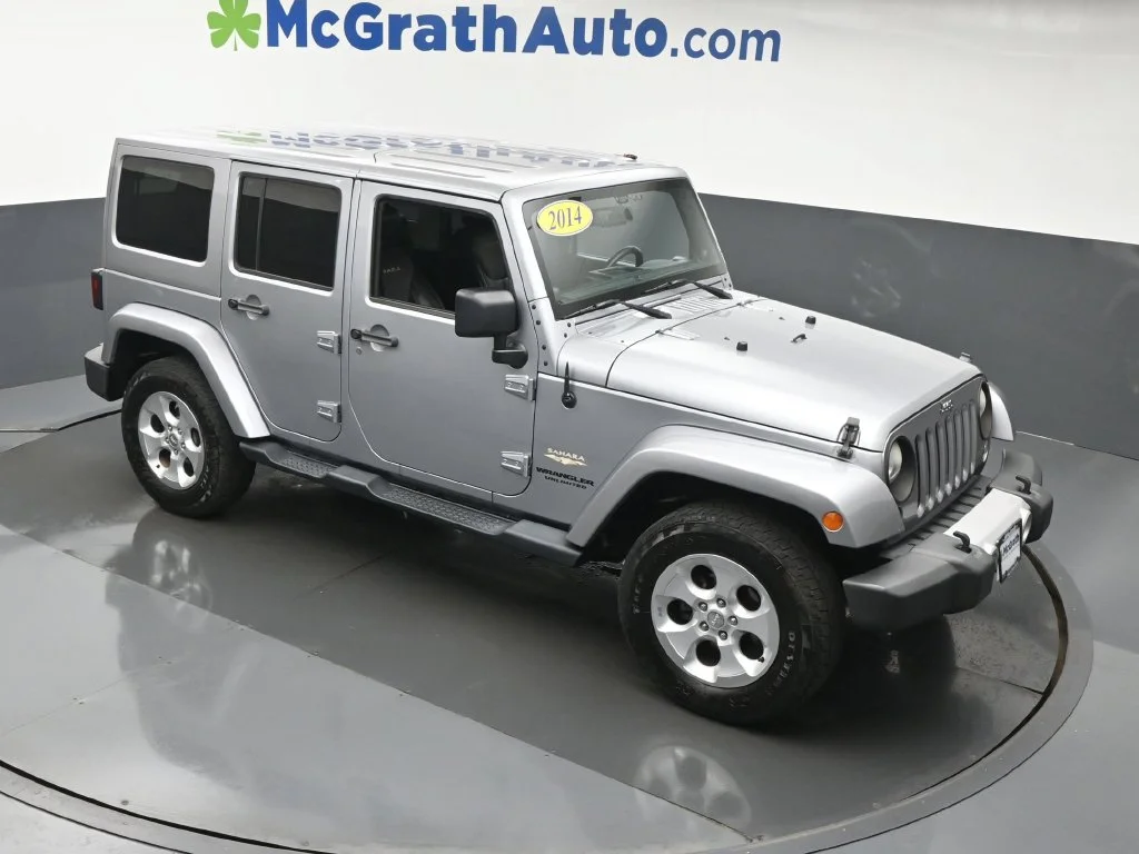 Used 2014 Jeep Wrangler Unlimited Sahara with VIN 1C4HJWEG8EL164188 for sale in Cedar Rapids, IA