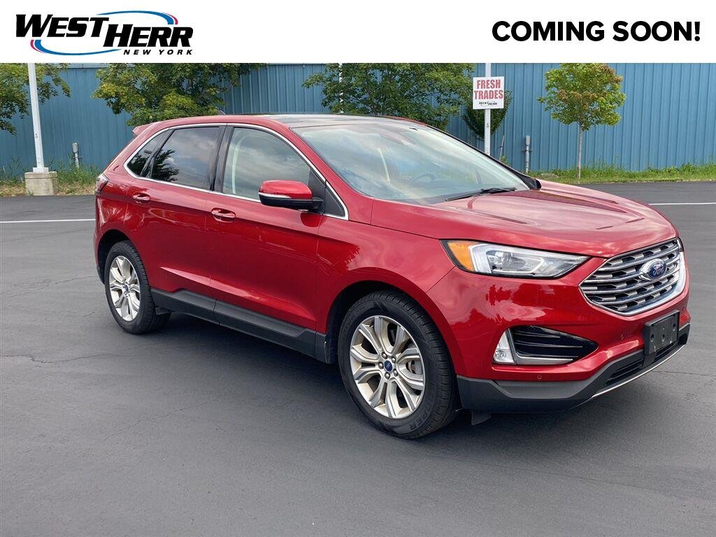 Used 2020 Rapid Red Metallic Tinted Clearcoat Ford Titanium image 1