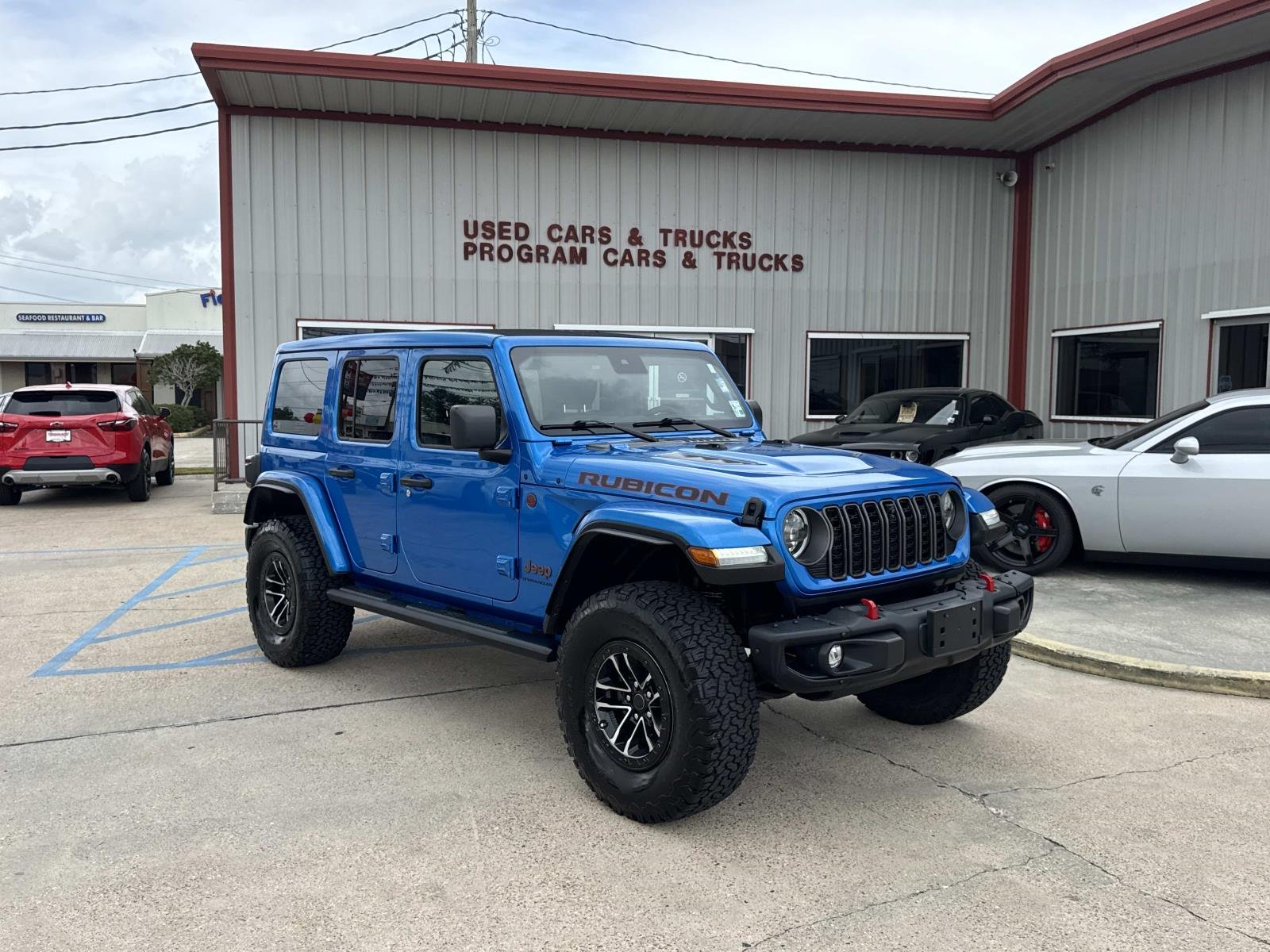 Used 2024 Hydro Blue Pearlcoat Jeep Rubicon X image 1