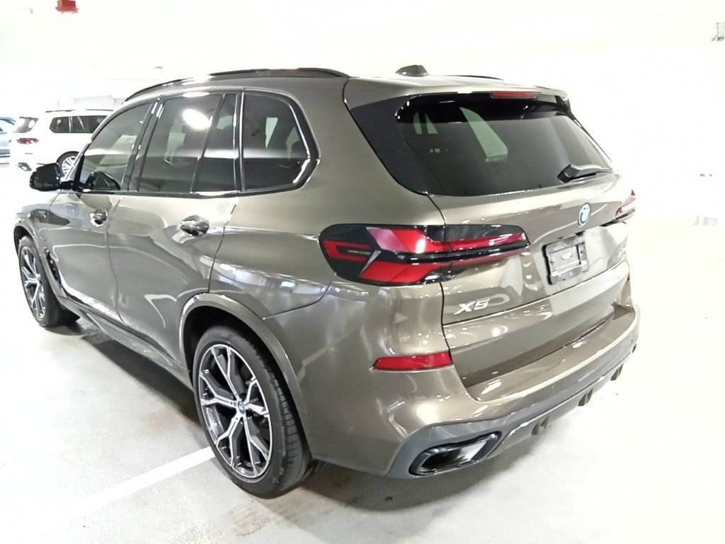 Used 2024 Manhattan Green Metallic BMW xDrive50e image 7