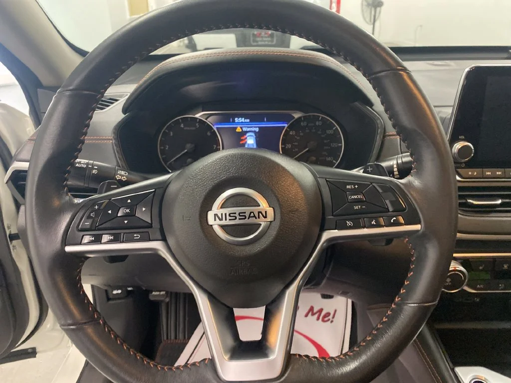 Used 2022 Pearl White Trico Nissan 2.5 SR image 16
