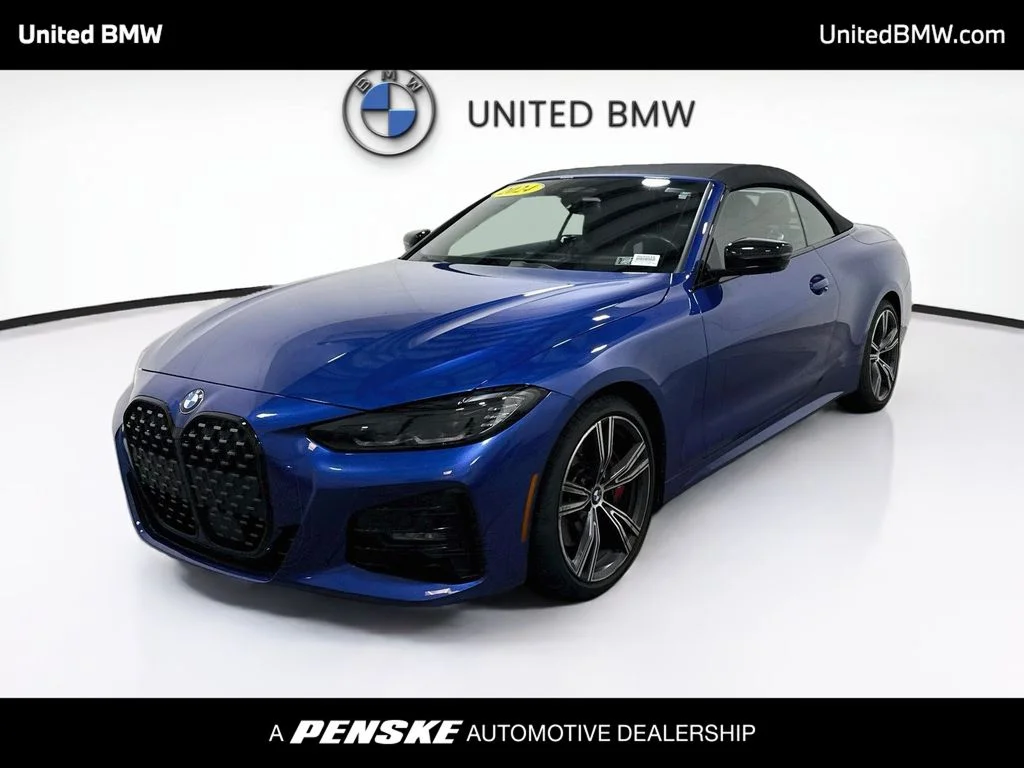 Used 2024 Blue Metallic BMW 430i xDrive image 1