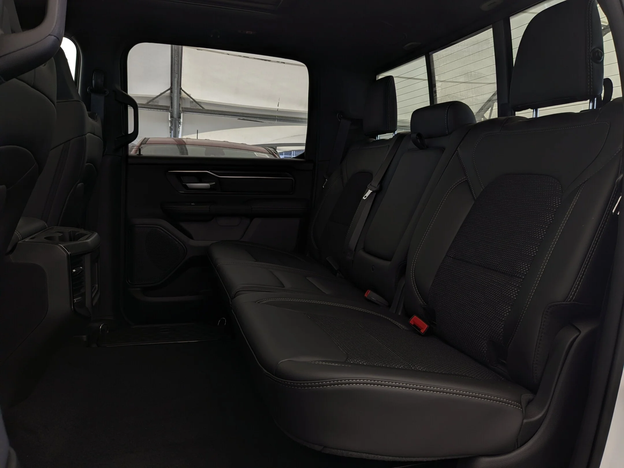 New 2026 White RAM Sport - - 2in Level Kit - Radar Renegade RT Tires - Tonneau Cover - Pano Sunroof & More! image 33