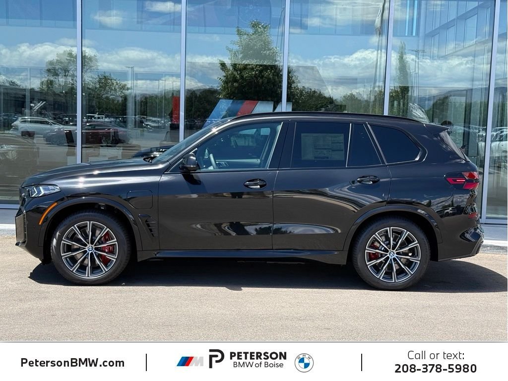 New 2026 Black Sapphire Metallic BMW xDrive50e image 2