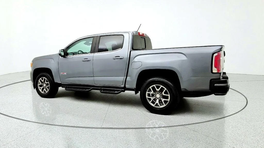Used 2019 Satin Steel Metallic GMC 4WD Crew Cab 128.3
