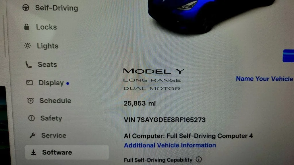 Used 2024 Deep Blue Metallic Tesla Long Range AWD w/ Full Self-Driving & Aero Disc Wheel Covers image 15