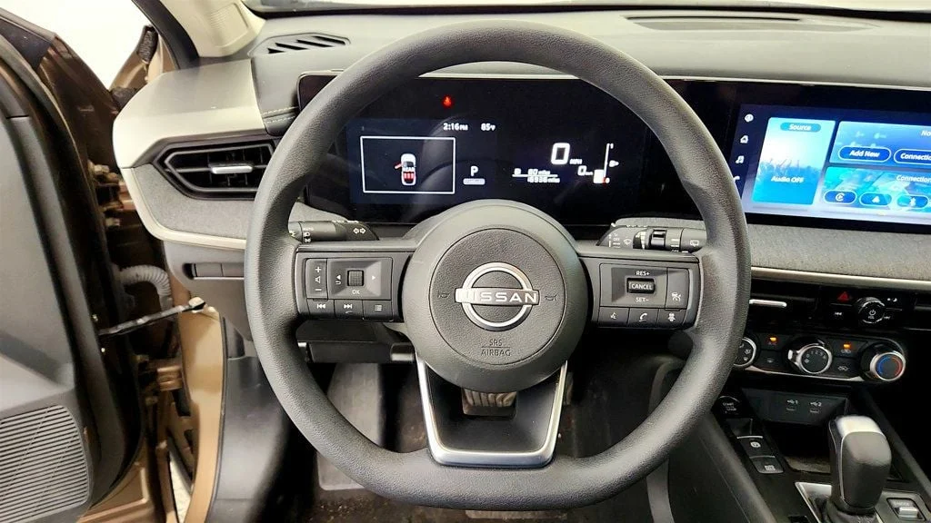 Used 2025 Canyon Bronze Metallic Nissan SV FWD image 13