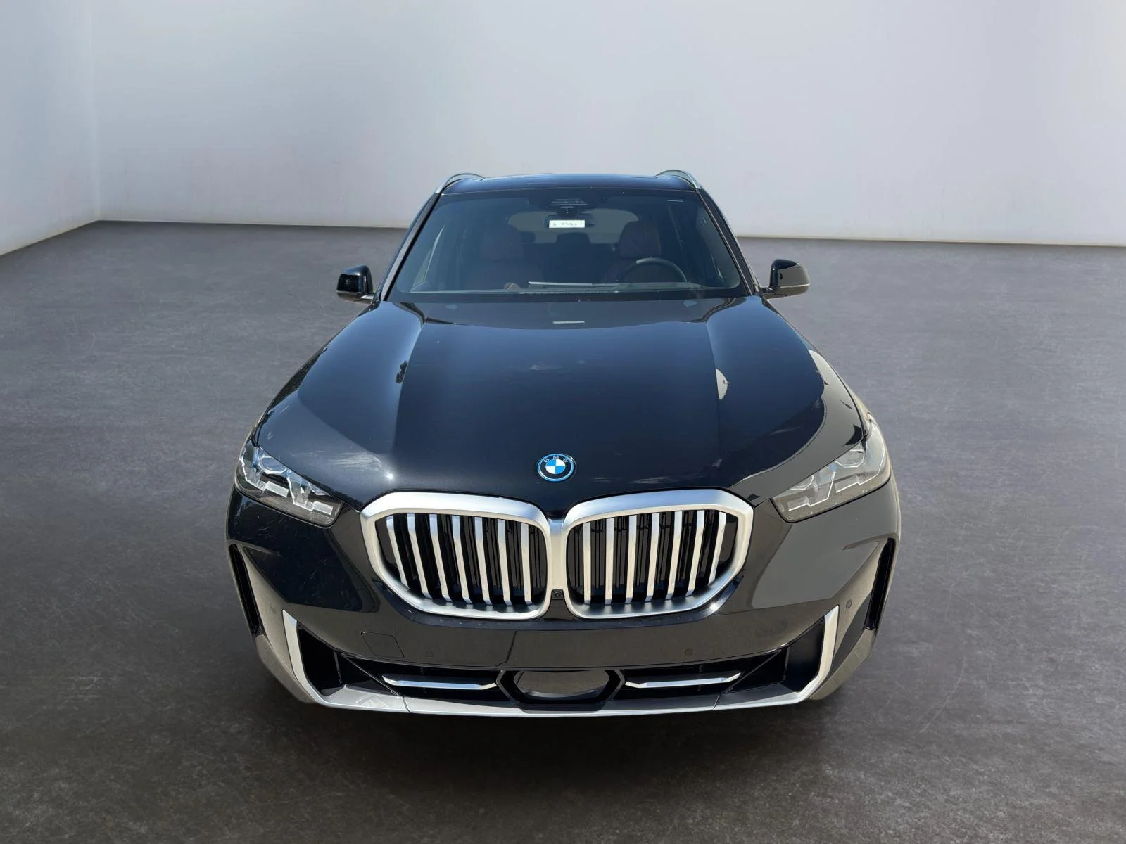 New 2026 Black Sapphire Metallic BMW xDrive50e image 10