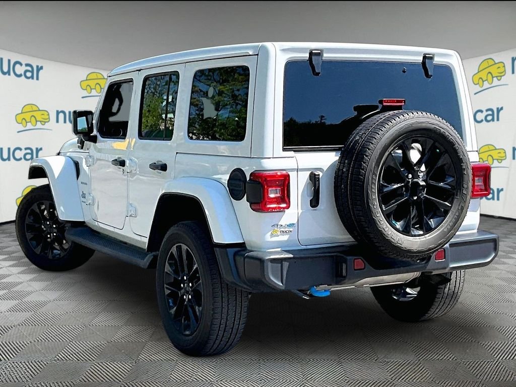 Used 2023 Bright White Clearcoat Jeep Sahara 4xe image 4