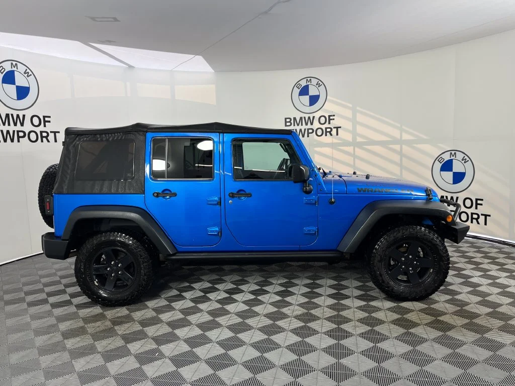 Used 2016 Blue Pearl Jeep Unlimited Sport image 6