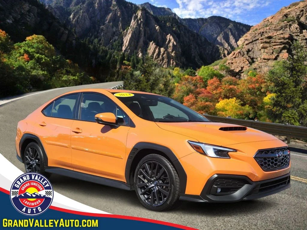 Used 2024 Orange Subaru Limited image 1