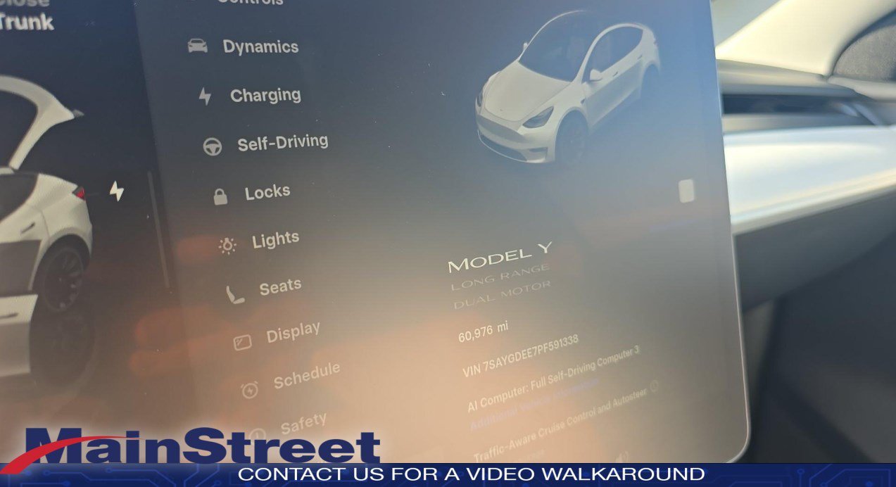 Used 2023 Tesla Model Y Long Range with VIN 7SAYGDEE7PF591338 for sale in Kansas City