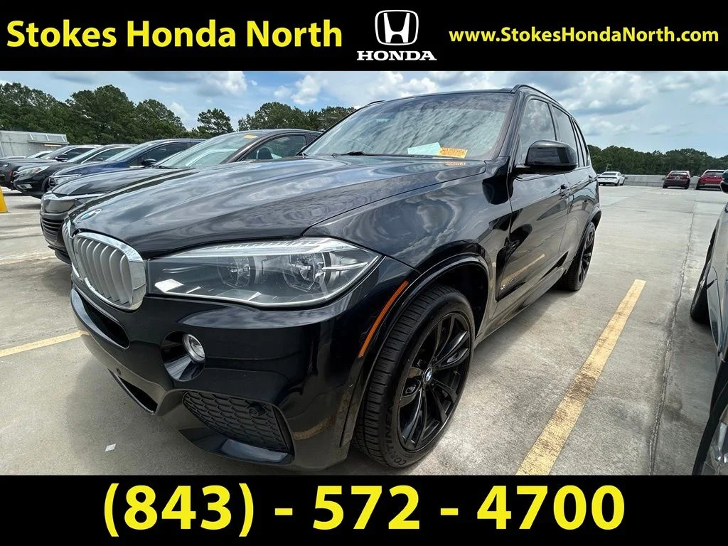 Used 2018 Black BMW xDrive50i image 1