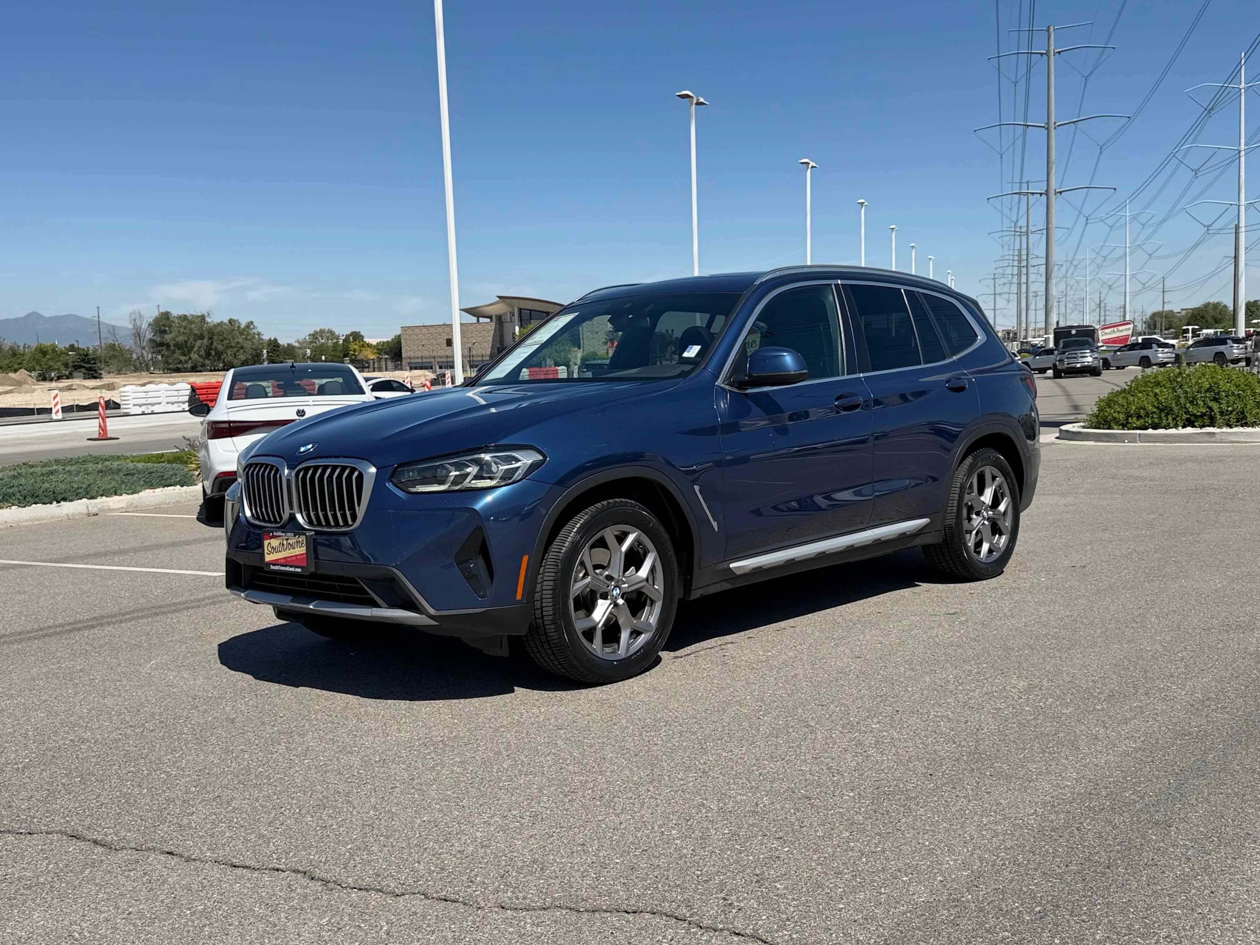 Used 2023 Phytonic Blue Metallic BMW xDrive30i image 1