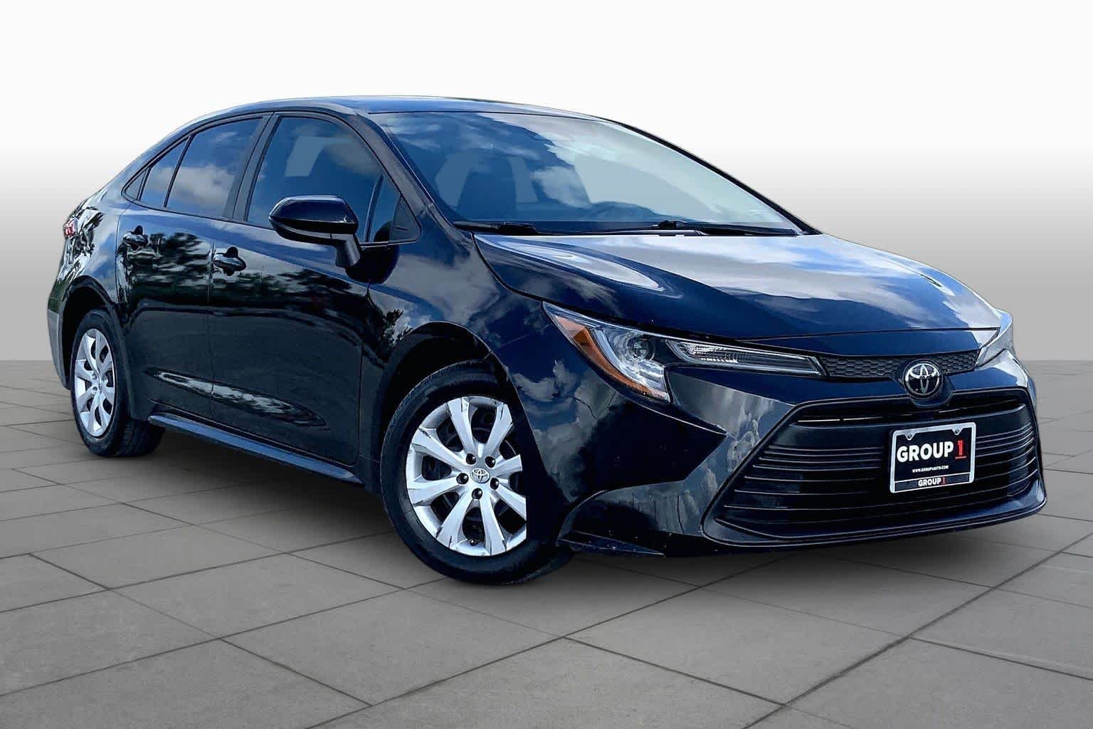 Used 2023 Midnight Black Metallic Toyota LE image 3