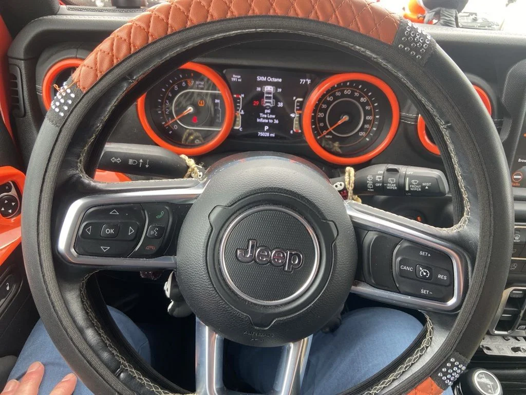 Used 2019 Orange Jeep Unlimited Sahara image 35