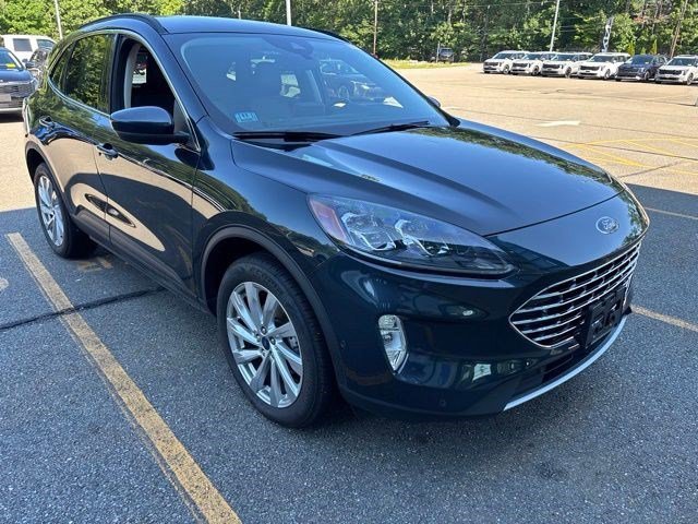 Used 2022 Blue Metallic Ford Titanium Hybrid image 1