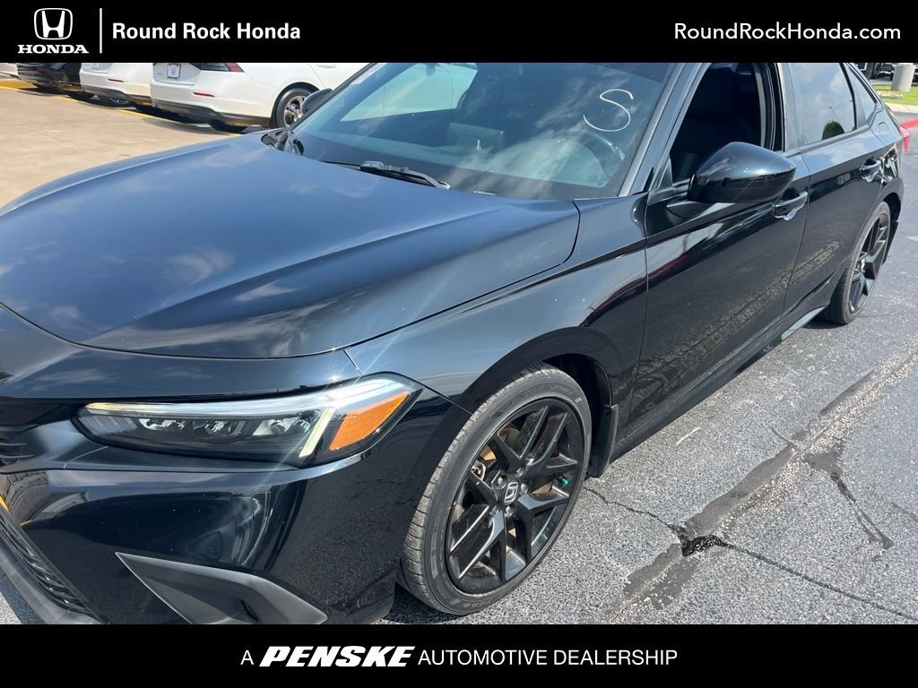 Used 2023 Crystal Black Pearl Honda Sport image 1