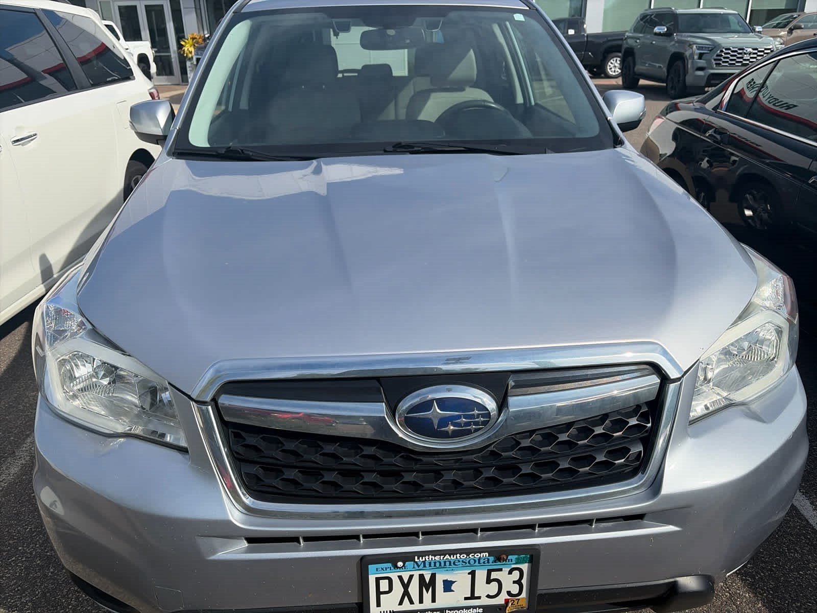 Used 2016 Subaru Forester i Touring with VIN JF2SJAXCXGH411737 for sale in Golden Valley, MN